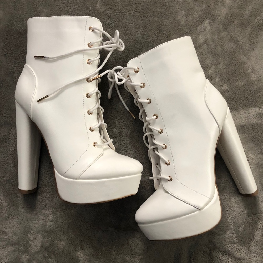High heel laced up boots